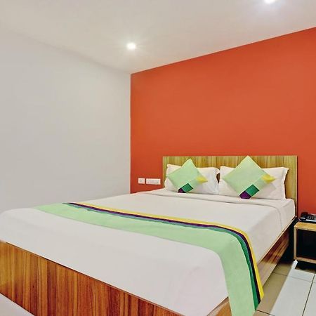 Treebo Sai Suites Inn Nagavara Bangalore Exterior photo