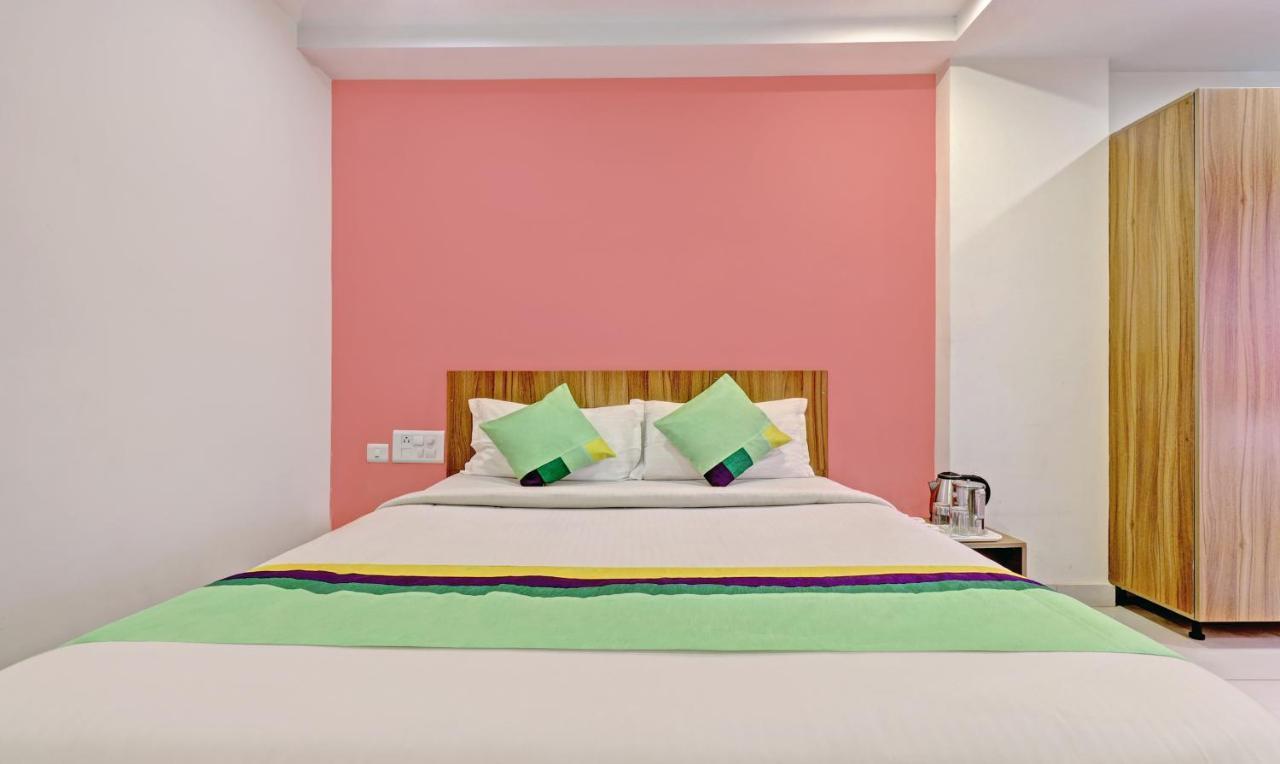 Treebo Sai Suites Inn Nagavara Bangalore Exterior photo