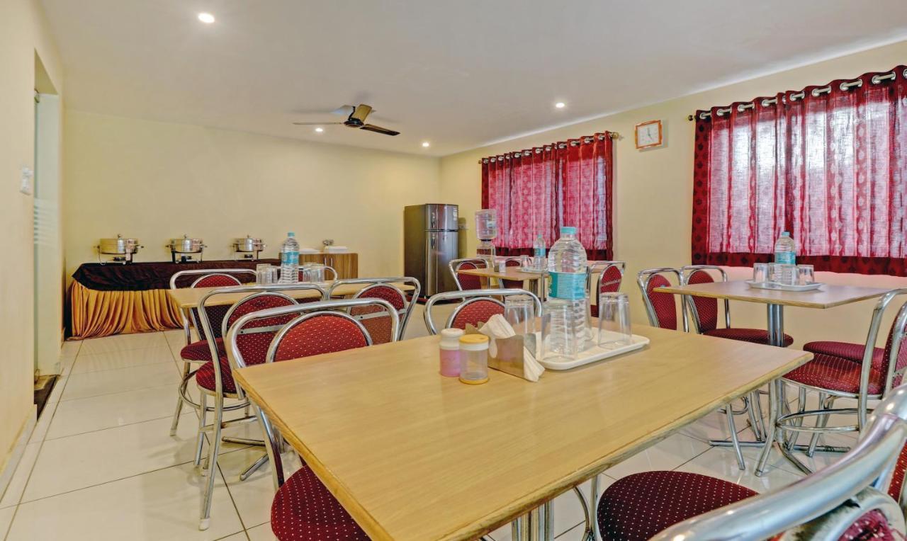 Treebo Sai Suites Inn Nagavara Bangalore Exterior photo