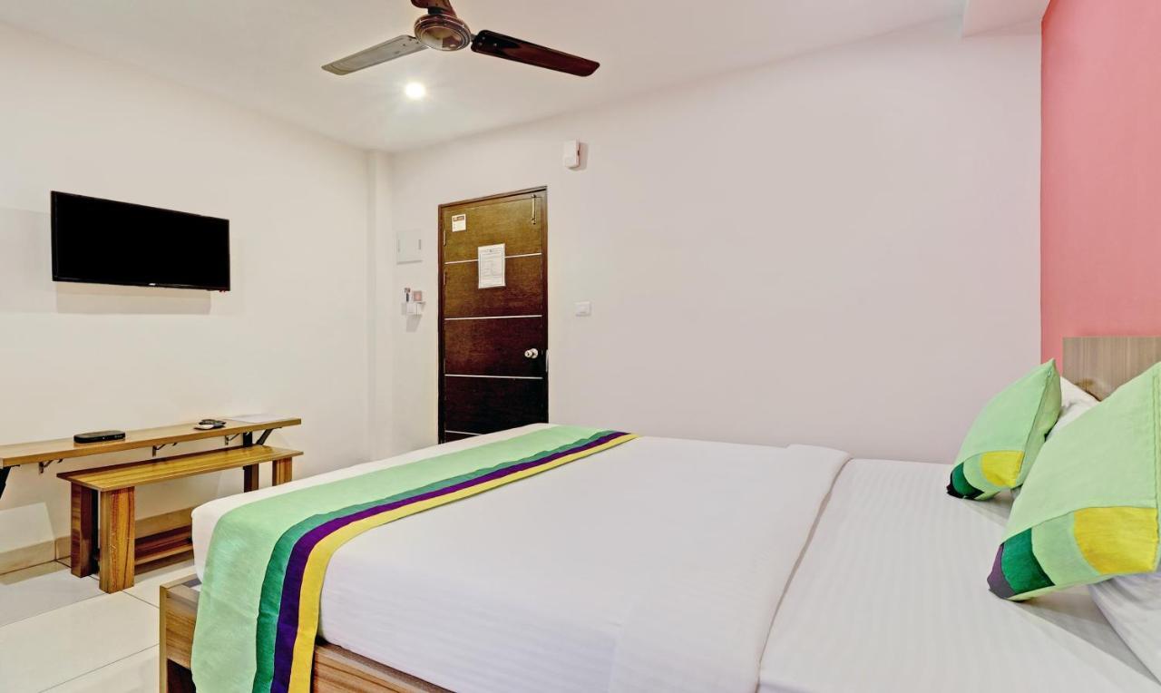 Treebo Sai Suites Inn Nagavara Bangalore Exterior photo