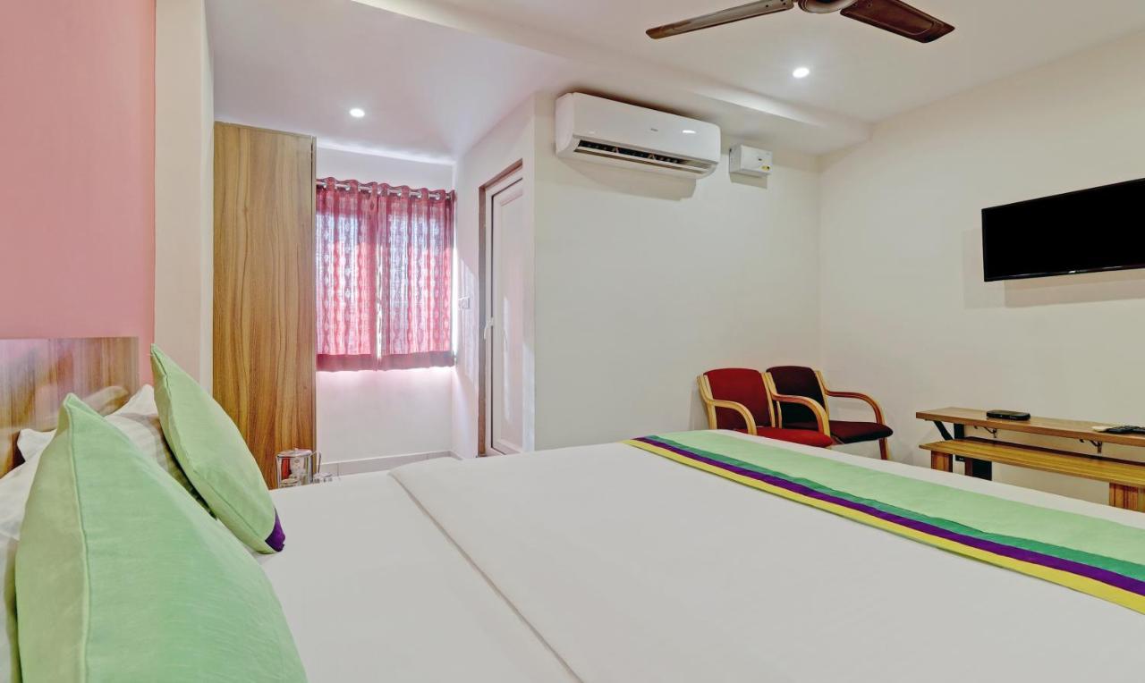 Treebo Sai Suites Inn Nagavara Bangalore Exterior photo