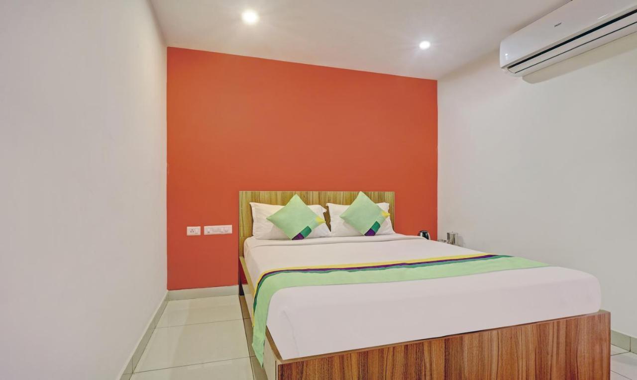 Treebo Sai Suites Inn Nagavara Bangalore Exterior photo
