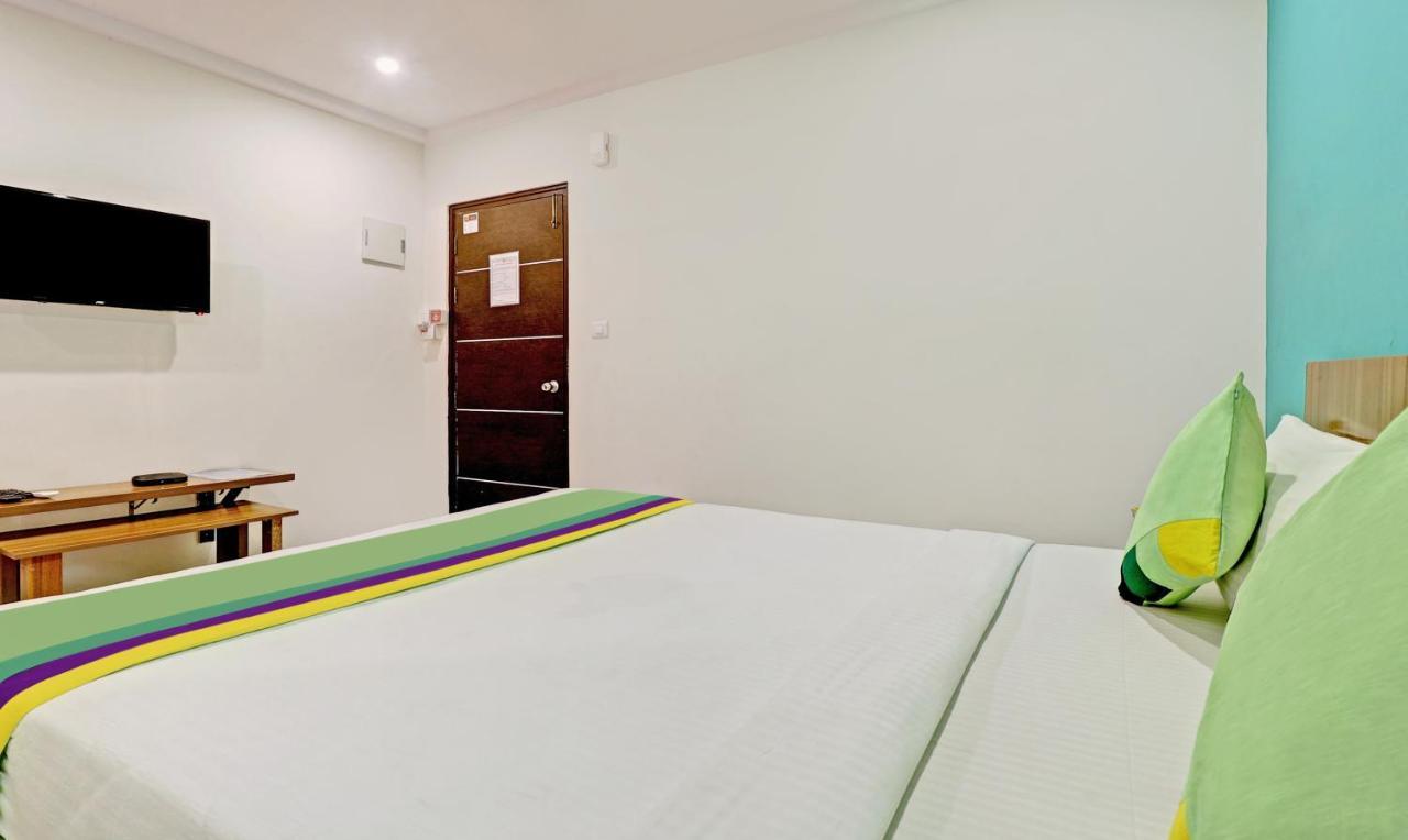 Treebo Sai Suites Inn Nagavara Bangalore Exterior photo