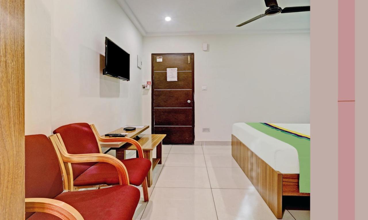 Treebo Sai Suites Inn Nagavara Bangalore Exterior photo