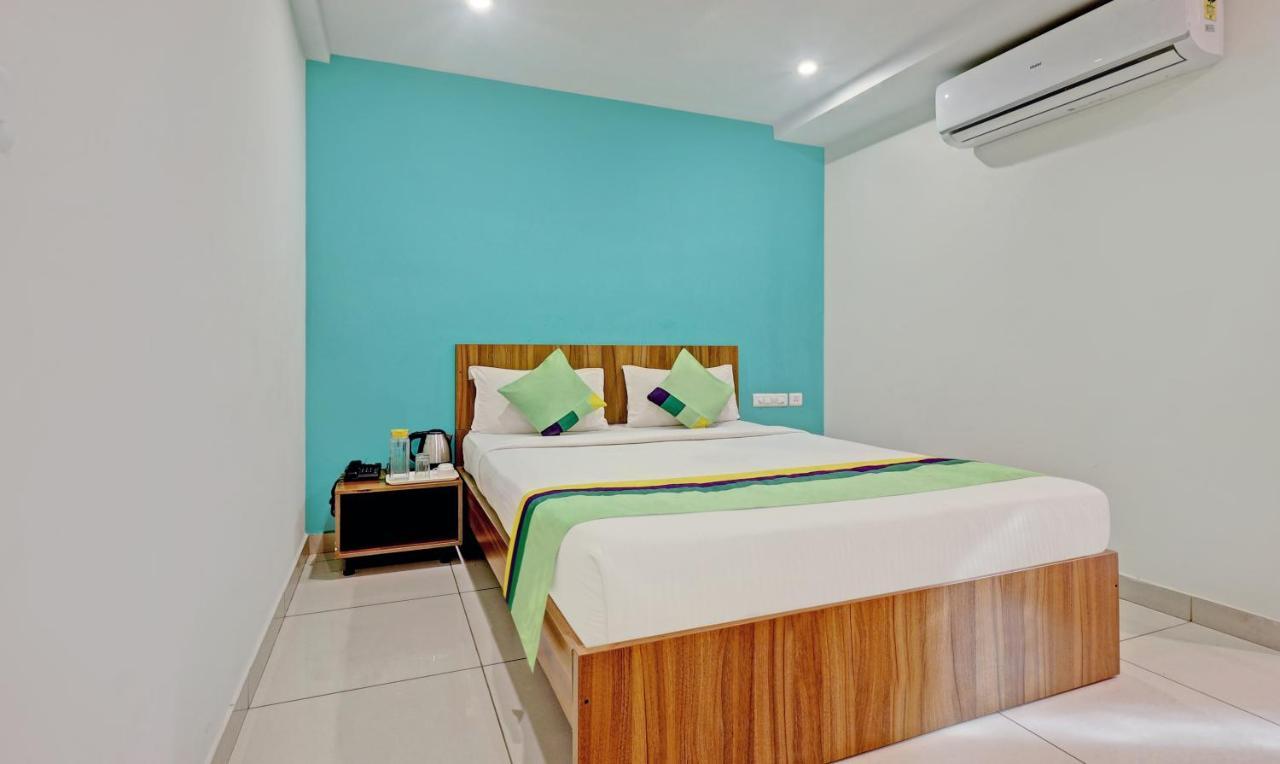 Treebo Sai Suites Inn Nagavara Bangalore Exterior photo